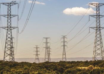 Electricity supply towers and structures transmit power along high voltage wires and cables